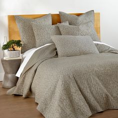 the comforter is neatly made and ready to be used in this bedding set