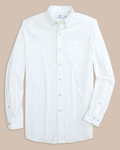 Nothing says clean and classic quite like a crisp white button-down. This sport shirt serves as a sophisticated staple for any Southern gentleman. Crafted from cooling, wicking, quick-dry flexible fabrics, it's got icon status with all the modern amenities. Style: 10638 Classic Button-up Shirt With Functional Buttons, Classic Unstructured Solid Color Shirt, Classic Unstructured Solid Shirt, White Classic Dress Shirt, Relaxed Fit, Classic White Dress Shirt Relaxed Fit, Classic White Relaxed Fit Dress Shirt, White Wrinkle-resistant Shirt For Work, White Wrinkle-resistant Work Shirt, Classic Unstructured Dress Shirt With Button Closure