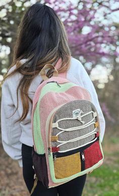 Organic Natural Himalayan Hemp Large Nepalese Boho Hippie Durable Cute Backpack These backpacks are made with love by the local artisans of the Himalayan Kingdom Nepal. Each backpack is handcrafted carefully and sewn together. Measurements: Approximate as it is handmade ~ Height - 17 inches ~ Width - 14 inches Highlights: ~ 1 Main zipped compartment ~ 2 to 4 Front zipped compartment ~ 2 side pockets for bottles ~ 1 Laptop compartment inside ~ Made in Nepal, No child labor used and fairly traded ~ Organically made, no harmful chemicals has been used ~ Perfect for Schools, College, Hiking, Backpacking, Travelling ~ Light weight ~ Unisex, perfect for all ages ~ Model is 5'5" about 130 lbs Remember to:  ~ Hand wash and outside dry  ~ Please don't hang with weight in the backpack OrganicHandmad Eco-friendly Multicolor Travel Backpack, Eco-friendly Multicolor School Backpack, Eco-friendly Multicolor Backpack, Eco-friendly Multicolor Rectangular Backpack, Eco-friendly Rectangular Multicolor Backpack, Boho Backpack School, Boho Backpack, Cute Backpack, Unisex Backpack