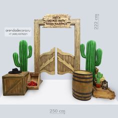 an image of a wooden gate with cacti and barrels in front of it