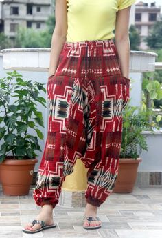 This Aztec Woolen Yoga Trouser or pant is warm and cozy, made from high-quality Acrylic Fibre. It is perfect for Winter. It has a comfortable elastic waist, and one size fits most. It is perfect for Holidays, Nightwear, Cool Winter Days, and Travel. Features: Spacious Loose-fitting Versatile Super comfortable Durable Easy to wear Place of Origin: Nepal MOQ: 10 pcs Note: For bulk order, we can customize the size and manufacture it in bulk with your own brand. Contact us. Casual Harem Yoga Pants, Casual Cotton Harem Yoga Pants, Red Non-stretch Casual Harem Pants, Casual Harem Yoga Pants With Pockets, Non-stretch Cotton Harem Pants For Loungewear, Casual Yoga Pants With Pockets For Festivals, Casual Winter Yoga Pants, Casual Red Harem Pants, Casual Red Cotton Harem Pants