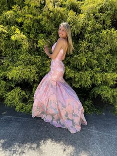 This exquisite floral organza jacquard gown provides a modernized look that will dazzle the onlookers. Featuring a form fitting mermaid silhouette with sweep train and a unique exposed back zipper detail, Rachel Allan 7087 Pink is sure to turn heads. Prom Season Mermaid Silhouette Gown With Fitted Bodice, Mermaid Silhouette Gown For Prom Season, Fitted Organza Gown For Homecoming, Fitted Floral Print Prom Gown, Fishtail Gown With Fitted Bodice For Homecoming, Fitted Floral Print Gown For Prom Season, Fitted Floral Print Gown For Prom, Spring Wedding Mermaid Dress With Fitted Bodice, Spring Prom Mermaid Dress With Mermaid Hem