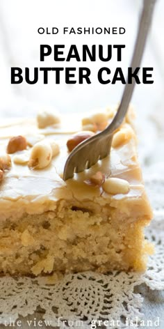 an old fashioned peanut butter cake on a doily with a fork stuck in it