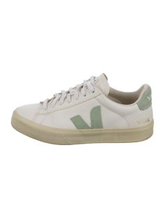 Veja Leather Low Top SneakersWhiteRubber & Suede TrimRound-ToesLace-Up Closure at UppersFit:Sneakers by Veja typically run large, consider taking a half size down.Unfortunately, due to restrictions, this item may not be eligible for shipping in all areas. White Vulcanized Sole Sneakers For Everyday, Everyday White Vulcanized Sole Sneakers, White Everyday Sneakers With Perforations, Green Sporty Sneakers For Everyday, White Round Toe Sneakers For Everyday, Everyday White Sneakers With Round Toe, Everyday White Round Toe Sneakers, Green Everyday Sneakers For Spring, Comfortable White Sneakers With Gum Sole