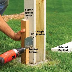 a man is working on the side of a building with wood framing and nailing