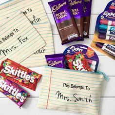 personalized candy bags with the names of different types and flavors are shown on a white table