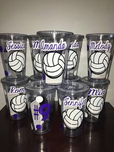 a group of cups with volleyball designs on them