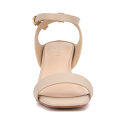 Be admired by some and envied by most when you wear the stunning Candida sandal. Featuring a wide strap and a block heel that almost resembles a wedge, these sandals are both unique and stylish. The hint of gold embellishment adds a touch of elegance, ensuring you stand out in any crowd. Perfect for elevating any outfit, the Candida sandal combines comfort and sophistication, making it a must-have addition to your shoe collection. Modern Open Toe Sandals With 4-inch Heel, Spring Ankle Strap Wedge Sandals With Sculpted Heel, Summer Wedge Block Heels With Wrapped Heel, Open Toe Block Heels With 4-inch Heel, Summer Wedge Heel Block Heels With Heel Strap, Chic Summer Wedge Heel Block Heels, Chic Summer Wedge Block Heels, Chic Summer Wedge Heels, Modern Sandals With Padded Wedge Heel