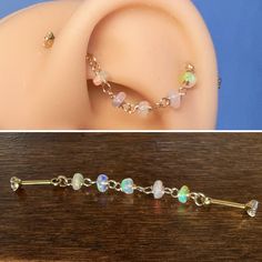 there are three different types of piercings on the same piece of jewelry that is attached to a doll's ear