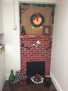 a fireplace decorated for christmas with wreaths and decorations