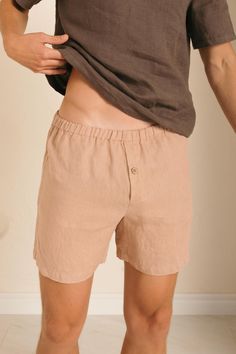 Men's linen boxer shorts with open fly and button closure.  This is the most popular and comfortable style of underwear for men.  Sustainable gift for him. Eco-friendly men's underwear or loungewear made from organic Lithuanian linen.  ITEM DETAILS: - Open fly buttoned with coconut button - Soft elasticated waist - Inseam length 5.5" (14 cm). - Washed and softened - Made in OEKO-TEX certified standard linen - Light or medium weight linen - your choice Shorts can be made to measure - please note inside leg length in comments section. Our model, a size S, is shown in a size S Caramel/Natural/Eggplant lightweight linen shorts CARE - Machine wash at 40oC/ 104oF - Tumble dry on a low heat or dry flat or hanging - Use gentle detergent and no bleach - Iron warm if necessary - After each wash line Linen Pjs, Pjs Shorts, Shorts Linen, Linen Lights, Mens Linen, Comfortable Style, Sleep Shorts, Shorts For Men, Gift For Husband