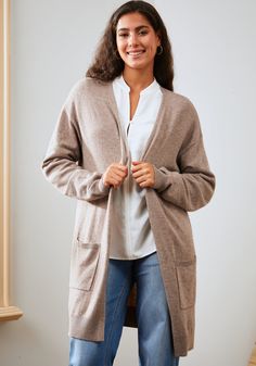 Step into a world of understated elegance with the SoftBlend Cashmere Long Line Cardigan. With its exquisite extended length and luxurious feel, this cardigan offers a relaxed yet sophisticated silhouette. Its practical pockets meld style with functionality, making it an impeccable choice for day-to-night ensembles. Relaxed, oversized fit. #collegeoutfit #woman  #rainydayoutfit #tailgatingoutfit #ad #usa #tallfashion #beachoutfit #casualoutfit #tallwomen #comfyoutfit #cardigan #blackcardigan #tall #curvywomen #cosyoutfit #falloutfit #winteroutfit Oversized Cashmere Cardigan For Layering, Chic Long Cashmere Cardigan, Elegant Oversized Cashmere Cardigan, Oversized Long Sleeve Cashmere Cardigan, Soft Knit Cashmere Long-sleeve Outerwear, Understated Elegance, Oversized Fits, A World, Shirts Tops