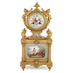 an ornate clock with cherubs and angels painted on the sides, in gold