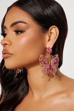 Available In Gold/Clear, Gold/Blue, And Gold/Pink. Drop Earrings Butterfly Design Rhinestone Detail Post Back Closure Final Sale Imported | Catching Butterflies Earrings in Gold/Pink by Fashion Nova Pink Crystal Earrings For Pierced Ears, Pink Jeweled Crystal Dangle Earrings, Pink Rhinestone Drop Earrings, Pink Drop Earrings With Rhinestones, Pink Jeweled Crystal Earrings, Party Jewelry With Rhinestones In Butterfly Shape, Butterfly-shaped Rhinestone Party Jewelry, Party Jewelry With Rhinestones And Butterfly Shape, Butterfly Shaped Party Jewelry With Rhinestones