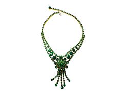 A stunning large Vintage Rhinestone Necklace - looks to be a 1970's piece in a beautiful dark green rhinestone I have absolutely no clue on the maker but I do know these pieces are getting harder to find it's in beautiful condition front and back. Green Jeweled Emerald Necklace, Green Emerald Jeweled Necklace, Green Crystal Necklace With Stones, Green Jeweled Necklace For Party, Green Necklace With Sparkling Stones For Party, Green Rhinestone Necklaces For Formal Occasions, Green Jeweled Evening Jewelry, Green Jeweled Jewelry For Evening, Green Necklaces With Sparkling Stones For Party