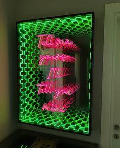 a neon sign that reads tell time you're not going in the mirror