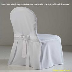 a white chair with a bow on it's back and the seat cover is folded down