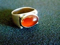 Beautiful Men's Gemstone Signet Ring. It is made out of Sterling Silver (aka Silver 925 each piece is stamped), 18k Gold (aka Gold 750), with a stunning Carnelian stone in its center... Luxury Classic Men's Carnelian Ring, Carnelian Signet Ring With Gemstone For Anniversary, Carnelian Gemstone Signet Ring For Anniversary, Carnelian Signet Ring For Anniversary, Fairy Tale Jewelry, Gents Ring, Signet Ring Men, Carnelian Ring, Carnelian Stone