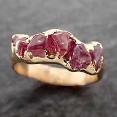 Lovely pink sapphire (home tumbled). I hand carved this setting in wax and cast it in recycled solid 18k yellow gold using the lost wax casting process. This one-of-a-kind gemstone ring is a size 7 it can be resized up or down for you as needed. The sapphire stones measure about 4-5mm. the band is around 3.5mm Throughout all time and history in every tribe and culture all around the world crystals, minerals and gemstones have been used for healing, luck, divination, adornment vibrational medicin Raw Stone Engagement Rings, Wax Ring, Raw Gemstone Jewelry, Raw Gemstone Ring, Sapphire Stones, Pink Polish, Wax Casting, Lost Wax Casting, Minerals And Gemstones