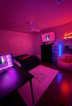 the room is lit up with neon lights