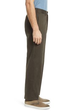 Classic and comfortable, these staple flat-front pants sport the polish of crisp cotton and the versatility to look smart at any occasion. 37" inseam; 17 1/2" leg opening; 11 1/4" front rise 100% cotton Dry clean Imported Business Casual Full-length Chinos, Business Casual Full Length Chinos, Casual Full-length Chinos For Business Casual, Spring Full-length Chinos With Welt Pockets, Full-length Chinos With Welt Pockets For Fall, Full Length Chinos With Welt Pockets For Fall, Fitted Cotton Cargo Pants For Business Casual, Spring Business Casual Full-length Chinos, Spring Business Casual Full Length Chinos