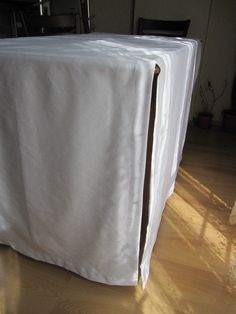 the table is covered with a white cloth