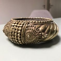 Attractive Vintage Ethnic Indian Bracelet, a heavy  bangle or anklet.  This is an extremely interesting, unusual and high quality piece. Very nicely worked and richly decorated. Made from high silver content. This is an extremely interesting, unusual and high quality piece. In very good condition  Dimensions  Circumference outside 40 cm and the circumference inside 27 cm. Height 4 cm  Weight 400 gram Metal Bangle With Intricate Design For Festival, Ornate Handmade Metal Bangle, Handmade Ornate Metal Bangle, Ornate Bangle Bracelet With Antique Finish, Silver Spiritual Brass Bangle, Spiritual Silver-colored Brass Bangle, Metal Bracelets For Rituals, Bohemian Metal Bangle With Intricate Design, Spiritual Ceremonial Bangle