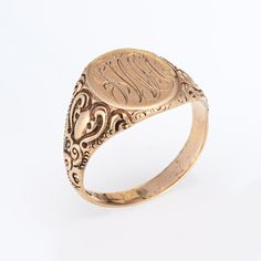 Lovely antique Victorian signet ring (circa 1880s to 1900s), crafted in 10 karat rose gold.   From what we can decipher, the center mount is engraved with the initials "PML"   The side shoulders feature a pretty scrolling design that terminates to the oval mount. The saddle of the ring is low and curves to the shape of the finger, rising 1.5mm from the finger (0.05 inches).     The ring is in good condition with patina and wear evident. We have not cleaned the ring in order to preserve the patina and collector value.    Particulars:  Weight: 5.8 grams  Stones:  N/A.  Size & Measurements: The ring is a size 11 (sizable). The mount measures 16mm in length (0.62 inches) and 12.5mm wide (0.49 inches), rising 1.5mm from the finger.   Metal & Hallmark: 10 karat rose gold. The ring is not hallmar Oval Signet Ring, Vintage Victorian, Antique Victorian, Signet Ring, Antique Vintage, Saddle, Patina, Initials, Rose Gold