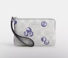 New with tags Coach Corner Zip Wristlet with Blueberry Print Silver/Chalk/Light Violet Style Number: CR817 Length: 6.25" Height: 4.0" Width: 0.5" Printed coated canvas and recycled leather Wrist strap attached Two credit card slots Zip-top closing Will ship with care. Ships from smoke/pet free home. Feel free to ask any questions. Thanks for looking. Blueberry Design, Blueberry Print, Coach Logo, Blue Color Schemes, Coach Wallet, Wristlet Keychain, Coach Wristlet, Signature Canvas, Recycled Leather