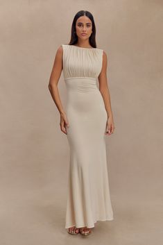 Understated glamour. The MALIA Slinky Ruched Maxi Dress is a masterclass in elegant design. Featuring a sophisticated boat neckline and daring open back, this bodycon dress flatters your silhouette with gathering detail at the bust. The fishtail hem adds a touch of drama, creating a graceful flow with every step. Fully lined for a smooth finish, Malia is the epitome of refined style. Bridal Shower Attire, Rehearsal Dinner Outfits, Understated Glamour, Wedding After Party, Ruched Maxi Dress, European Summer Outfits, Maxi Dress Sale, Capsule Outfits, Refined Style