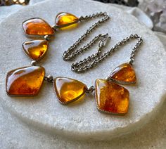 Beautiful Arts N Crafts Raw Honey Amber Silver Vintage Bib Festoon Necklace Luxury Amber Necklaces With Stones, Vintage Amber Necklaces For Jewelry Making, Retro Pendant Necklaces For Jewelry Making, Luxury Amber Necklaces With Gemstone Accents, Elegant Luxury Amber Crystal Necklaces, Luxury Amber Oval Necklaces, Amber Necklace Women, Unique Amber Necklace With Polished Finish, Handmade Amber Metal Necklace