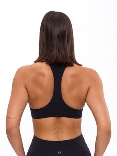 Sporty Racerback Crop Top With Built-in Bra, Fitted Racerback Crop Top With Built-in Bra, Stretch Crop Top With Built-in Bra For Training, Athleisure T-back Sports Bra With Seamless Construction, Workout Racerback Bra With Built-in Padding, Fitted Racerback Bra With Built-in Padding, Sporty High Stretch Crop Top With Built-in Padding, Supportive Stretch Bra With Built-in Padding, High Stretch Scoop Neck Sports Bra With Built-in Bra