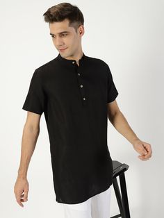 This is a black half-sleeve pure linen short kurta with a mandarin collar. Conveniently placed pockets on the sides of the Kurta for your wallet and phone. A subtle statement of class every day, anywhere. Collar: Mandarin Collar. Fabric: 100% Pure Linen(44 LEA Pre-Shrunk) Our linen wear goes through our proprietary Linius process to ensure zero-shrinkage and superior hand-feel with the perfect fit, finish, and fall in Linen. We at linen trail use 44-60 LEA count which works best for shirts as th Linen Kurta For Men, Short Kurta For Men, Kurta For Men, Short Kurta, Chinese Collar, Linen Short, Pure Linen