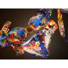 For Sale Is Stunning Nwt Luli Fama Bikini1)Small Jeweled Bandeau Top 2)Small Bottom The Bikini Has A Very Beautiful Colorful Print! Dear Buyers, Also Pls, Ask Questions Before Buying Please!I'll Be Happy To Answer Them ))) All Sales R Final, So No Returns Please. Check Out My Other Vs Items. * I' M Aiming At Getting A 100% Positive Rating, So Please Make Sure You Leave 5 Stars After You Receive Your Beautiful Items))) I Will Do The Same For You! I Do Combined Shipping, So You're More Than Welcom Tropical Print Beachwear For Parties, Printed Multicolor Swimwear For Festival, Tropical Party Swimwear, Fitted Bohemian Swimwear For Party, Tropical Printed Party Swimwear, Multicolor Tropical Print Triangle Top Swimwear, Tropical Halter Neck Swimwear For Festival, Multicolor Tropical Print Triangle Swimwear, Fitted Tropical Print Swimwear For Party