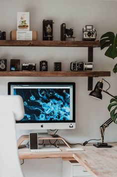 a desktop computer sitting on top of a wooden desk