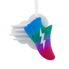 an ornament shaped like a shoe hanging from a string