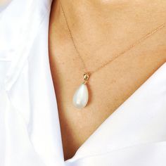 This stunning pendant is set in 14k Solid Yellow Gold with Natural White Moonstone drilled with utmost precision. It is an unique gemstone pendant for nearly every occasion and is completely hassle-free jewelry. 🔷ABOUT GEMSTONE: White moonstone, with its milky opalescence and subtle shimmer, is a gem of ethereal beauty and mystical allure. This radiant gemstone embodies the gentle power of the moon, encouraging emotional balance, intuition, and inner wisdom. White moonstone is a symbol of new b Elegant Moonstone Pendant Jewelry, White 14k Gold Drop Jewelry, Elegant Moonstone Jewelry With Pearl Pendant, White Pear-shaped 14k Gold Jewelry, Timeless White Drop Jewelry, Timeless White Pear-shaped Jewelry, White Pear-shaped Timeless Jewelry, Elegant Moonstone Gemstone Necklace, Elegant White Gemstones With Accents