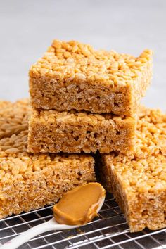 three pieces of peanut butter rice krispy treats stacked on top of each other