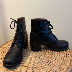 Like New Heeled Combat Boots. Rounded Toe 5.17” Shaft Height 8.25” Calf Circumference 2.5” Heel Leather Lining Very Little Wear On Heels And Soles Lugged Rubber Outsoles Leather Lace-up Moto Boots With Reinforced Heel, Black Lace-up Boots With Buckle Closure And Round Toe, Black Mid-calf Lace-up Boots With Reinforced Heel, Black Lace-up Heeled Boots With Lug Sole, Black Moto Boots With Front Lace-up Fastening, Heeled Combat Boots, Frye Shoes, Moto Boots, Combat Boots