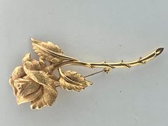 CHAREL vintage beautiful large goldplated rose brooch.  Measures 1 1/2 x 3 5/8 inches. Excellent condition. Substantial.  Signed CHAREL on the back. Nice statement piece. Formal Gold Brooch With Rose Design, Rose Brooch, Vintage Fans, Flower Vintage, Vintage Flowers, Etsy Vintage, Statement Pieces, Brooch Pin, Brooches