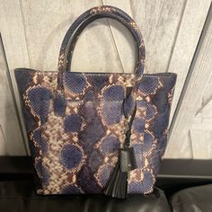 Hello Poshers! This Listing Is For A New Wt Kate Spade Blue Snakeskin Madison Collection Tote Bag. This Bag Was Purchased For Me As A Gift At A Sample Sale But Never Worn. I Love The Bag But I Have Way Too Many Lol. This Bag Is Unique, One Of A Kind, And Not Sold In Stores. Make Me An Offer Happy Poshing! Kate Spade Shoulder Bag With Leather Handles For On-the-go, Evening Blue Shoulder Bag With Leather Handles, Blue Leather Tote Satchel, Luxury Blue Shoulder Bag For On-the-go, Blue Leather Handheld Shoulder Bag, Blue Handheld Shoulder Bag With Leather Handles, Blue Bags With Leather Handles For Errands, Chic Blue Bags With Leather Handles, Kate Spade Handheld Leather Shoulder Bag