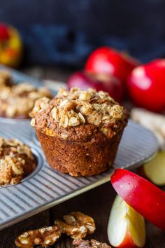 muffins with apples and walnuts in the background