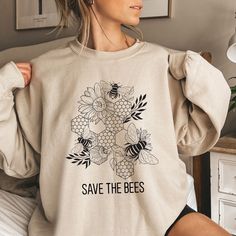 "This Beekeeper Gift graphic hoodie/sweatshirt is the most thoughtful way to show your appreciation for your relatives and friends on Earth Day or World Bee Day. DESCRIPTION How To Order 1. Kindly check and review all photos for your reference. 2. Choose your Hoodie/Sweatshirt size. 3. Choose your Hoodie/Sweatshirt color 4. Click add to cart when done. 5. If you need more than 1 item, please go back and add more. 6. Click \"Proceed to check out\". 7. If you have any questions please contact us. Graphic Print Long Sleeve Hoodie For Gift, Graphic Print Long Sleeve Hoodie As A Gift, Psychology Shirts, Christian Sweaters, Christian Shirts Designs, Idee Cricut, Jesus Sweatshirts, Sweatshirt Aesthetic, Christian Hoodies