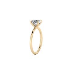 This elegant solitaire ring features lustrous metal gracefully rising like vines reaching for the sun, subtly evoking nature's beauty. The center stone is securely held by classic claw prongs, while the band gently tapers from 2mm to 1.2mm, offering a sleek and sophisticated finish. Center Stone: 2.5ct Round F/VVS2 IGI Certified Lab-Grown Diamond (included with ring) Ring Details: Width: 2.0mm Material:14k Solid Gold, choice of Yellow, White or Rose Timeless Solitaire Jewelry With Round Band, Elegant Gold Crystal Ring With Single Diamond, Refined Classic Cut Solitaire Jewelry, Minimalist Yellow Gold Jewelry With Center Stone, Timeless Solitaire Round Cut Jewelry, Elegant Single Diamond Round Stone Ring, Elegant Single Diamond Ring With Round Stone, Refined Moissanite Solitaire Jewelry, Elegant Rings With Single Diamond