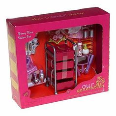 a pink doll house with furniture and accessories in the box, including a hairdryer