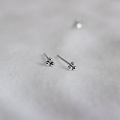 Real 925 Sterling Silver Dainty 3mm Triple Ball Stud Earrings These lovely earrings can be used in Earlobe, Tragus and Cartilage. Measures 3mm Comes with pushback backings Sold by Pair Jewelry will come in a gift box * Please read shop policy before placing an order * Elegant Hypoallergenic Silver Nose Studs, Nickel-free Sterling Silver Nose Studs, Nickel-free Sterling Silver Nose Stud, Hypoallergenic Sterling Silver Nose Stud, Dainty Nickel-free Silver Nose Studs, Classic Tiny Silver Cartilage Earrings, Minimalist Nickel-free Silver Nose Studs, Silver Minimalist Pierced Nose Studs, Minimalist Silver Pierced Nose Stud