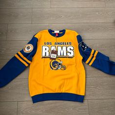 La Rams Crewneck Sweatshirt Size Small! Never Work! Oversized! Throwback Long Sleeve Tops With Letter Print, Team Spirit Crew Neck Top With Ribbed Cuffs, Throwback Blue Tops With Letter Print, Throwback Blue Top With Letter Print, Blue Throwback Tops With Letter Print, Game Day Crew Neck Top With Ribbed Cuffs, Blue Crew Neck Sweatshirt With Team Spirit, Blue Long Sleeve Team Spirit Sweatshirt, Blue Long Sleeve Sweatshirt With Team Spirit