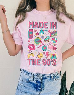 This Made In The 90's Comfort Color Shirt is the perfect addition to any retro lover's wardrobe. Featuring a funny and nostalgic message, this shirt will transport you back to the good old days of the 1990s. It's the perfect shirt for a 1990s party or just to show off your love for that era. The vintage style and comfortable fit make it a must-have for anyone who was raised on 90's culture. Don't miss out on the chance to take a trip down memory lane with this Raised on 90's tee. Comfort Colors introduces its garment-dyed t-shirt; a fully customizable tee made 100% with ring-spun cotton. The soft-washed, garment-dyed fabric brings extra coziness to your wardrobe while the relaxed fit makes it an excellent daily choice. The double-needle stitching throughout the tee makes it highly durable Retro Short Sleeve Top For Birthday, Pop Culture Crew Neck Top For Birthday, Retro Letter Print Tops For Birthday, Pink Pop Culture Tops For Summer, Vintage T-shirt With Funny Print For Birthday, Vintage Graphic Print Top For Birthday, 90s Inspired Graphic Print Birthday T-shirt, 90s Inspired Graphic Print T-shirt For Birthday, 90s Inspired Graphic Print T-shirt For Birthdays