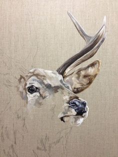 a painting of a deer with antlers on it's head