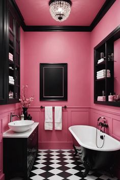 a black and white checkered floor in a bathroom with pink paint on the walls